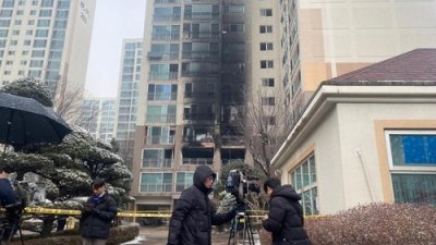 首尔公寓圣诞节大火酿2死29伤　英勇爸背子女逃生罹难